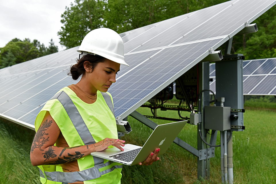 IRB-student-solar-laptop-6×4-LTC_3797 IRB student entering data at the solar panels